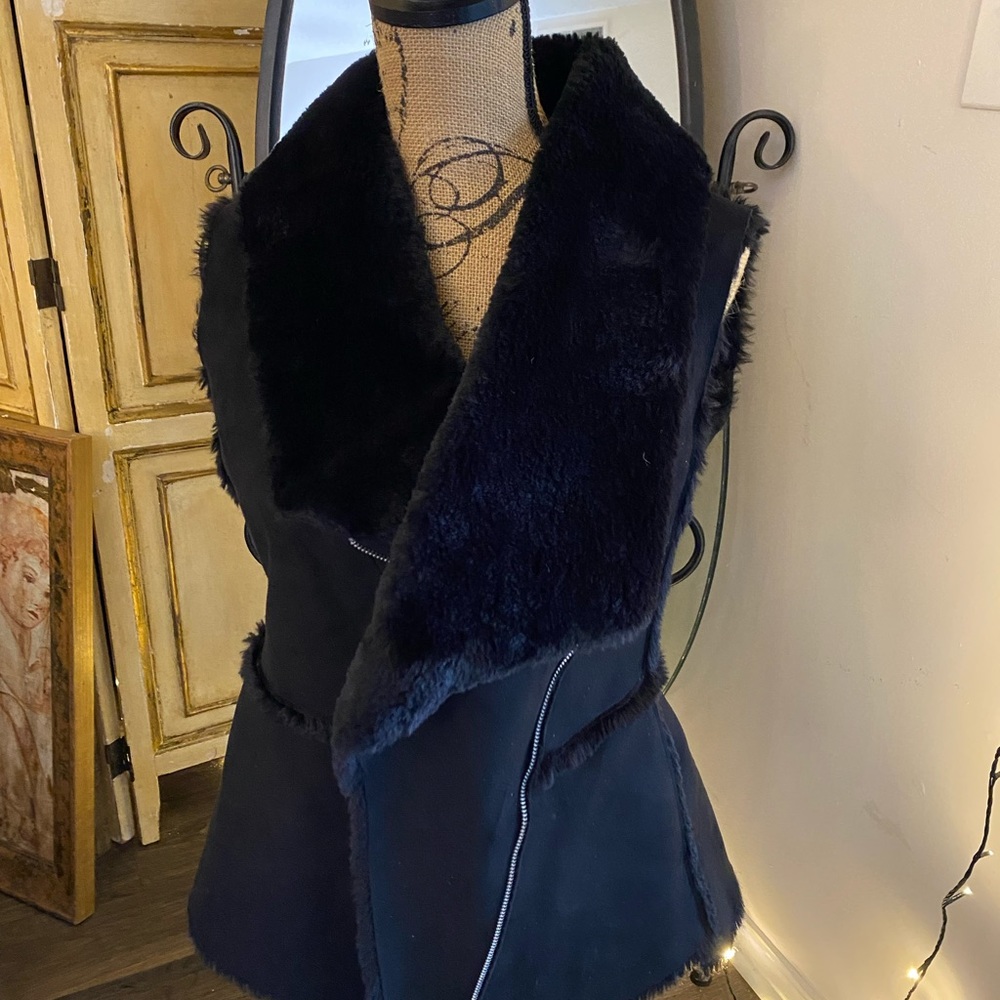 White House Black Market faux fur vest. XS.